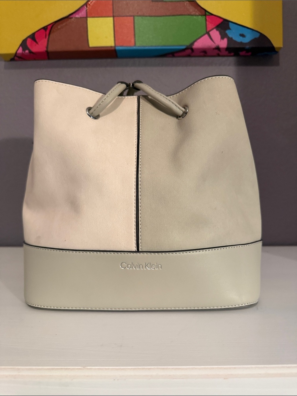 Calvin Klein Two-Tone Cream Drawstring Bucket Shoulder Bag